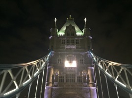 One of the towers of London Bridge lit up at night