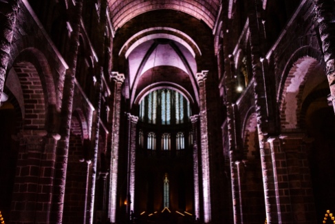 Inside the abbey of Mont Saint Michel during the nighttime lit tour